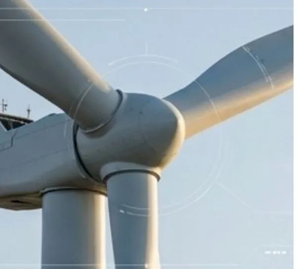 Close view of a wind turbine hub and rotor blades